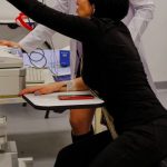 Diagnose - Young Doctors Looking at the Screen of a Medical Equipment