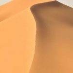 Travel - A Person Walking in the Middle of the Hot Desert