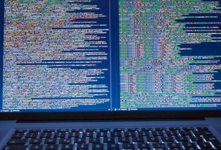 Open Source - Black Laptop Computer Turned on Showing Computer Codes