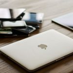 Smartphones - Macbook and Ipad on Desk