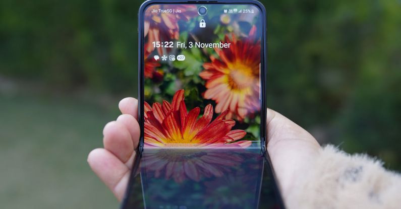 Foldable Phones - Hand with Foldable Smartphone